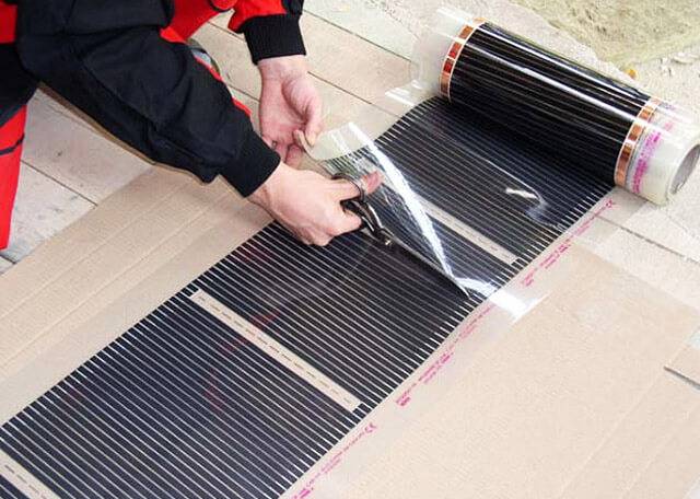 Sélection et pose de film infrarouge pour chauffage au sol