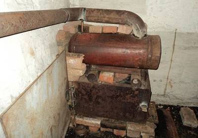 Comment construire un poêle à ventre avec de l'huile usée: instructions sur photos et dessins