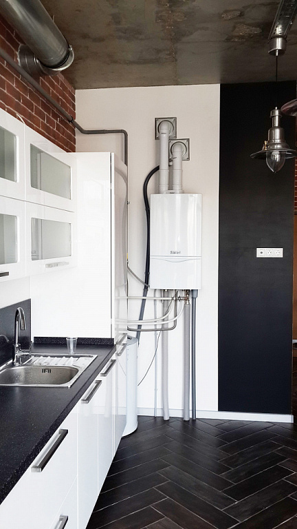 Comment cacher un geyser dans la cuisine : les meilleures façons de se déguiser + les exigences de sécurité