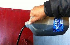 Caractéristiques de l'agencement du chauffage à l'huile usée à l'aide de poêles et de chaudières