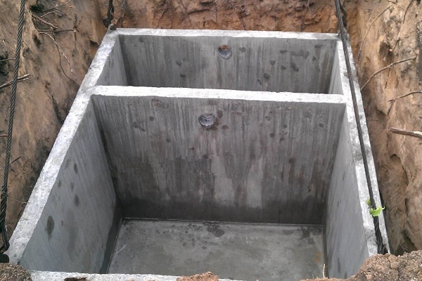 Fosse septique en béton monolithique à faire soi-même: schémas et règles d'aménagement d'une fosse septique en béton