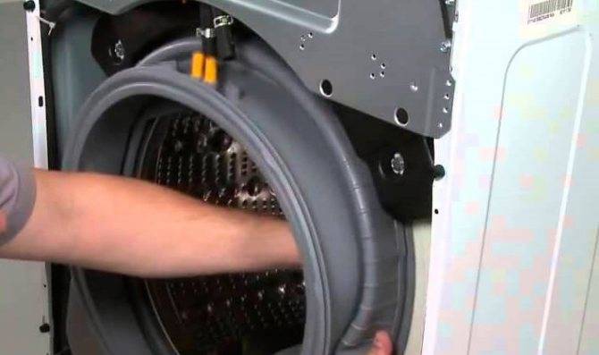 Brassard de machine à laver: objectif, instructions de remplacement et de réparation