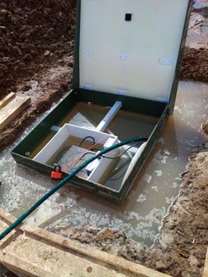 Comment aménager une fosse septique avec un niveau élevé d'eau souterraine: options pour résoudre un problème urgent