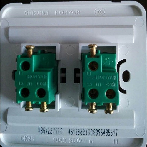 Comment brancher un interrupteur double pour deux ampoules : schémas + conseils de branchement