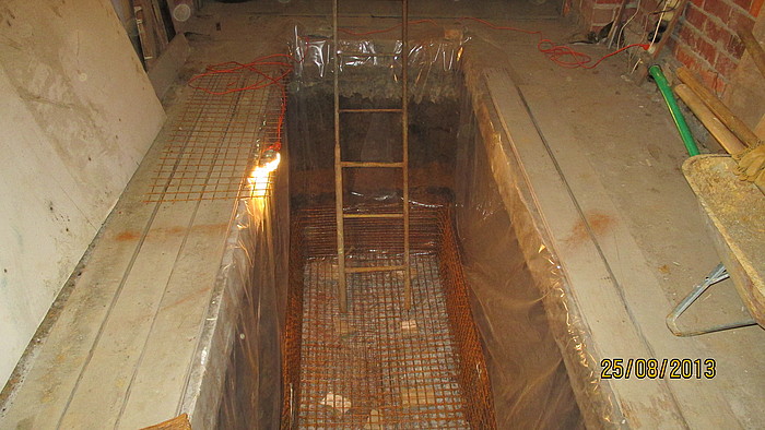 Trou d'inspection à faire soi-même dans le garage: pas facile, mais possible