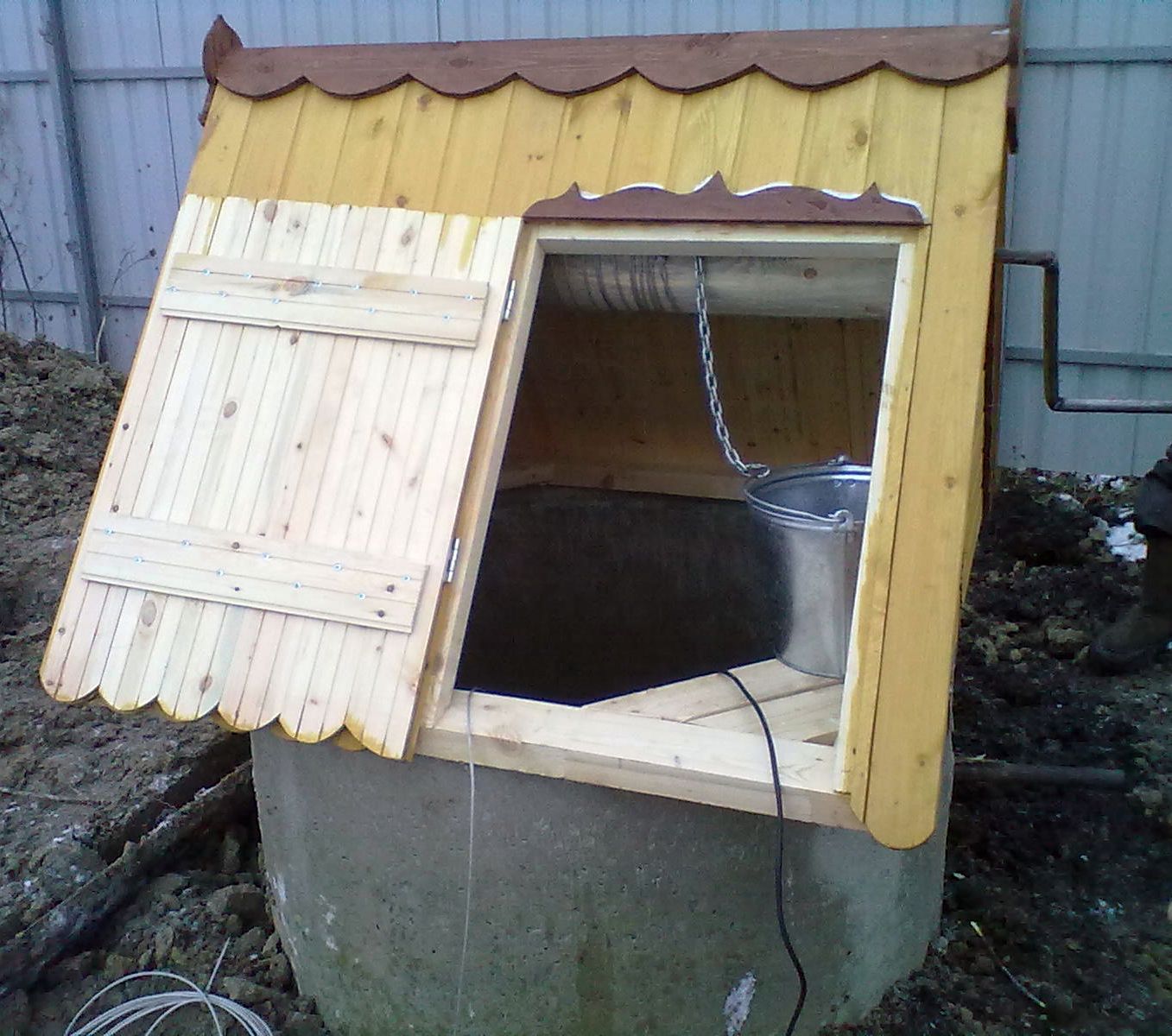 Instructions étape par étape sur la façon de construire une maison pour un puits de vos propres mains