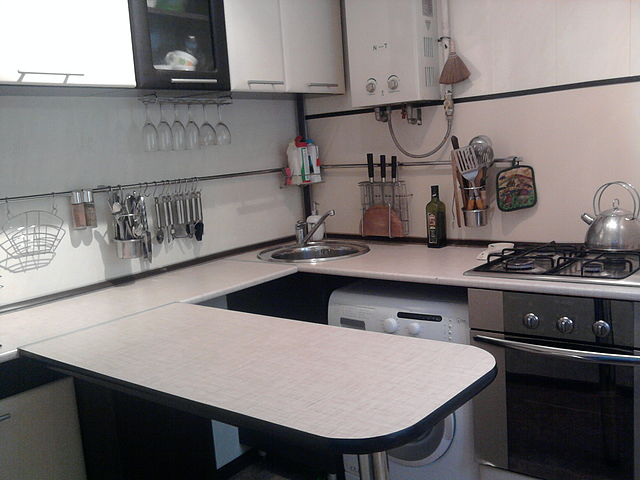 Comment cacher une chaudière à gaz dans la cuisine: les meilleures options de conception et astuces de déguisement