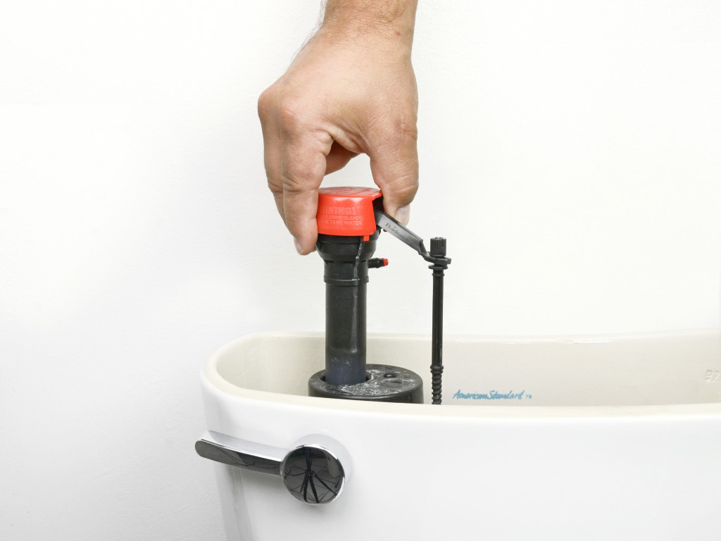 L'appareil et le réglage du réservoir de vidange avec un et deux boutons