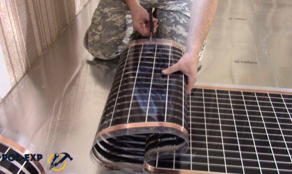 Chauffage au sol sous stratifié sur un sol en béton : nuances de design + notice de pose détaillée