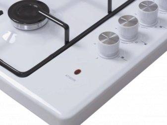 Pourquoi avez-vous besoin d'un tiroir inférieur dans une cuisinière à gaz: façons d'utiliser une palette carrelée