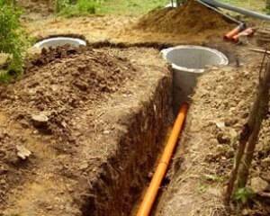 Puisard à deux chambres d'anneaux en béton: la meilleure installation à chambre unique + étape par étape