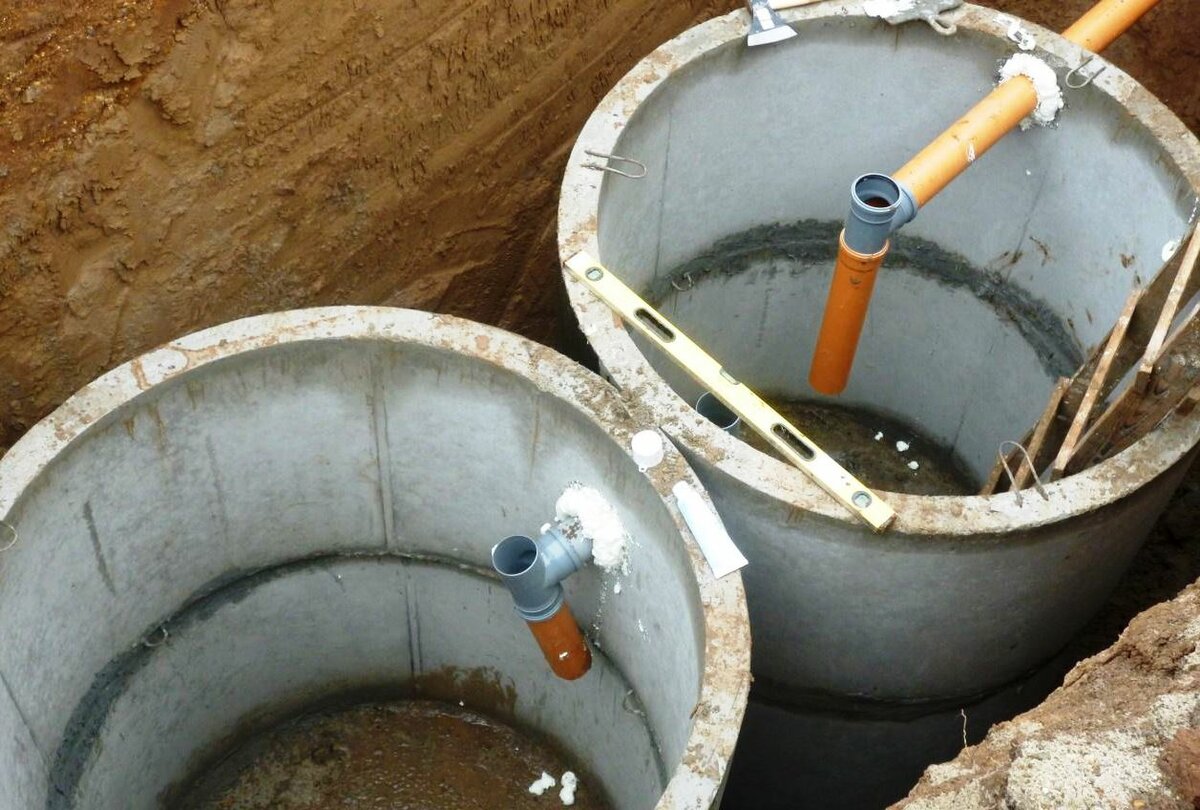 Comment imperméabiliser une fosse septique à partir d'anneaux de béton