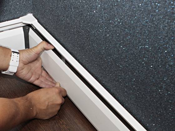 Chauffage par plinthes: caractéristiques de l'installation d'une plinthe chauffante à eau et électrique