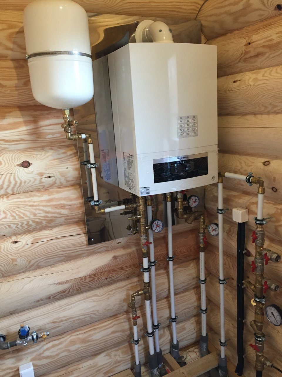 Raccordement d'une chaudière à gaz à double circuit au système de chauffage: règles et instructions d'installation