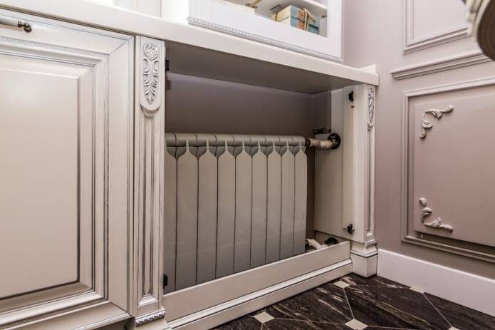 Comment cacher les tuyaux de chauffage dans une maison ou un appartement