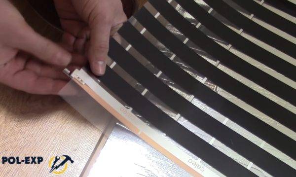 Chauffage au sol sous stratifié sur un sol en béton : nuances de design + notice de pose détaillée