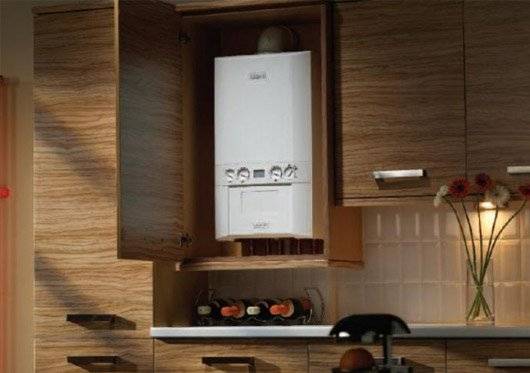Comment cacher un geyser dans la cuisine : les meilleures façons de se déguiser + les exigences de sécurité