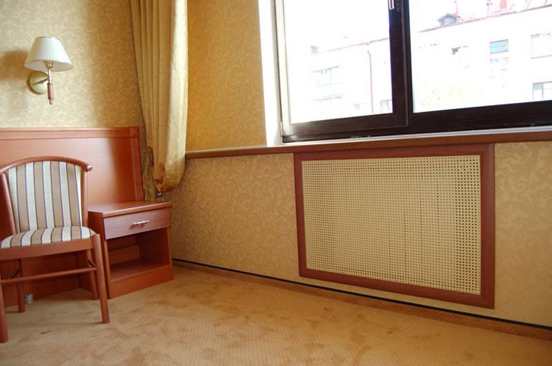 Écrans décoratifs pour batterie de chauffage : aperçu des différents types de grilles + conseils pour choisir