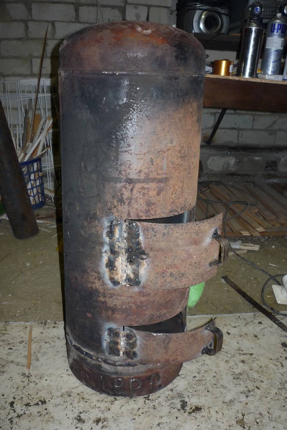 Poêle à ventre à faire soi-même à partir d'une bouteille de gaz: instructions de fabrication