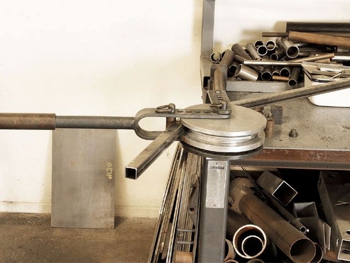 Comment les tuyaux métalliques sont pliés: subtilités technologiques du travail