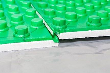 Isolation pour un sol à eau chaude: règles de choix et de pose