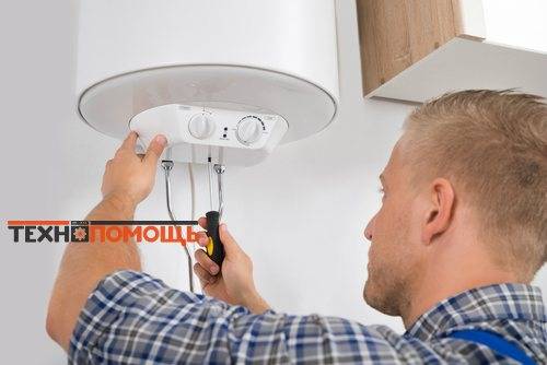 Nous installons un chauffe-eau instantané électrique de nos propres mains