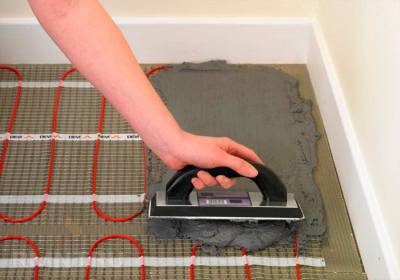 Pose d'un sol chauffant sur un carrelage : est-ce possible ?