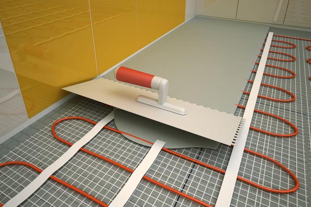 Pose de carrelage sur un sol chaud (électricité, eau) de vos propres mains