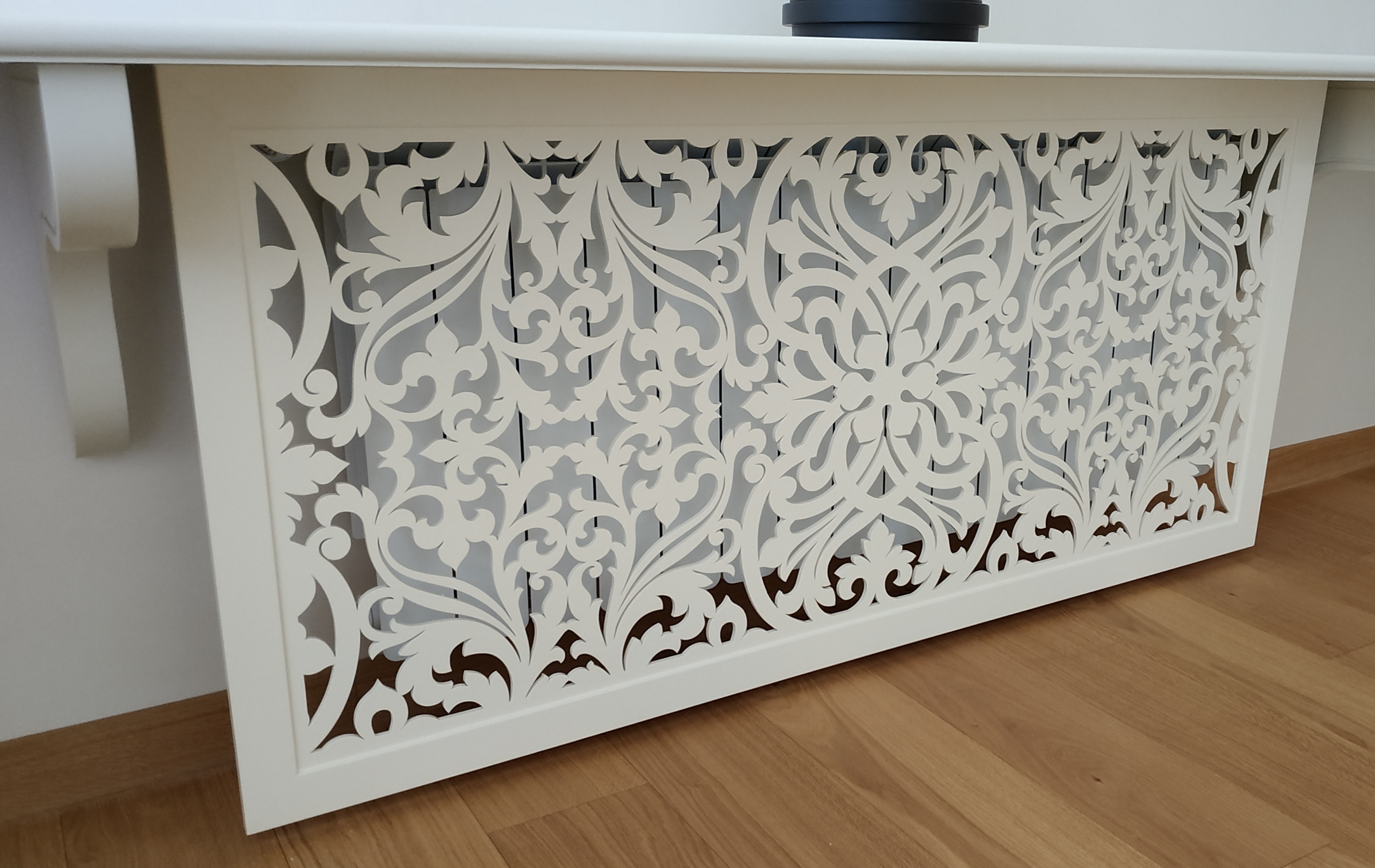 Grille de radiateur chauffant : à quoi sert l'écran et comment est-il fixé à la batterie