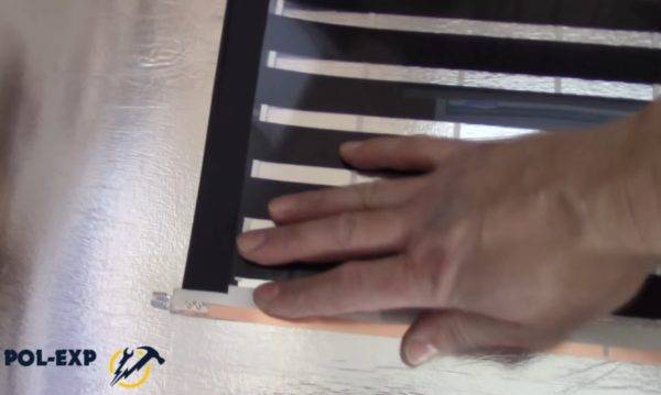 Chauffage au sol sous stratifié sur un sol en béton : nuances de design + notice de pose détaillée