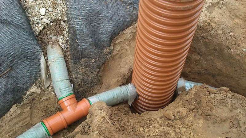 Schéma de drainage autour de la maison: les nuances de la conception des systèmes de drainage