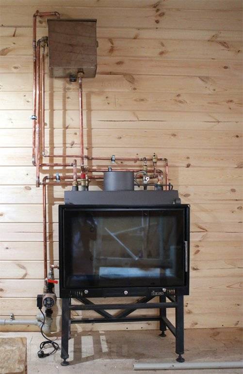 Chauffage à la vapeur dans une maison privée à partir d'un poêle à charbon, son schéma, comment le faire soi-même