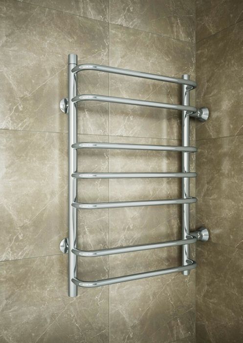 Installer un sèche-serviettes électrique dans la salle de bain de vos propres mains