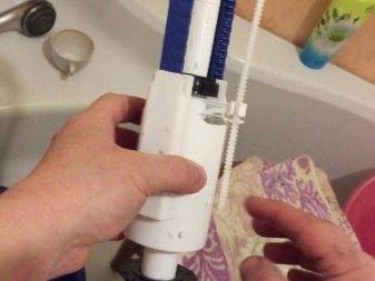 Robinetterie de réservoir de toilette: comment fonctionne et fonctionne un dispositif de vidange