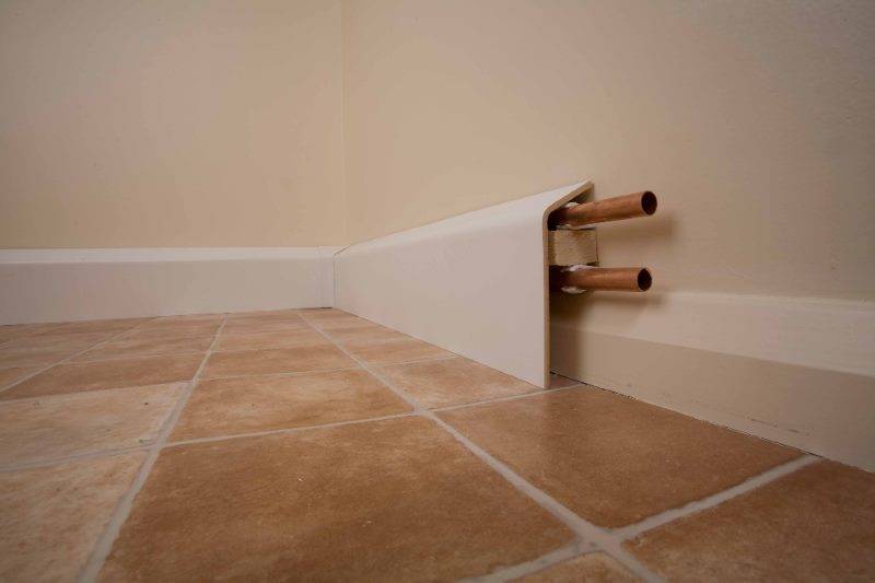 Comment cacher les tuyaux de chauffage dans une maison ou un appartement